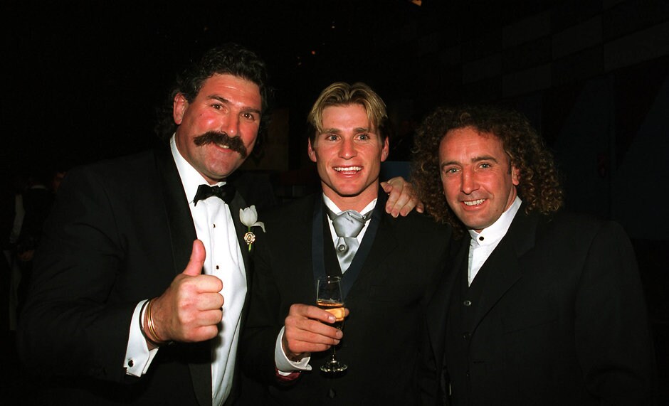 AFL 1999 Media - Brownlow Medal Presentation 200999 Former Brownlow Medal winners (L) Robert Dipierdomenico and (R) John Platten both former Hawthorn players congratulate (C) Shane Crawford of Hawthorn after winning the prestigious award at the Brownlow Medal presentation at the Horden Pavillion Function Centre in Sydney on September, 1999.